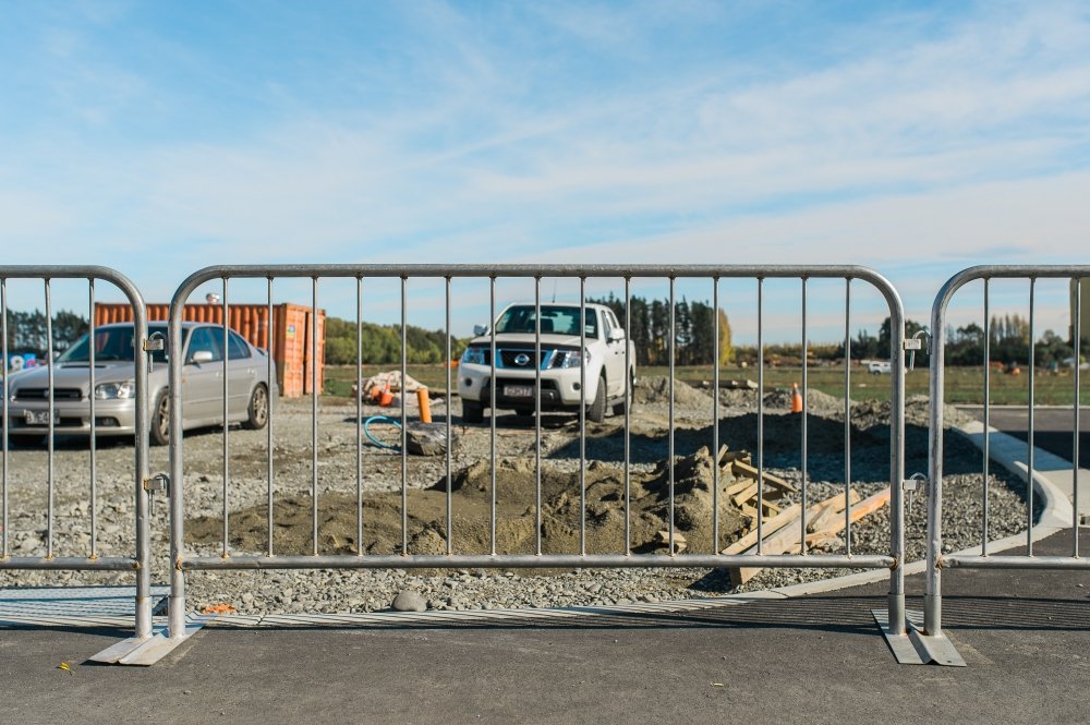 Pedestrian barriers past construction sites